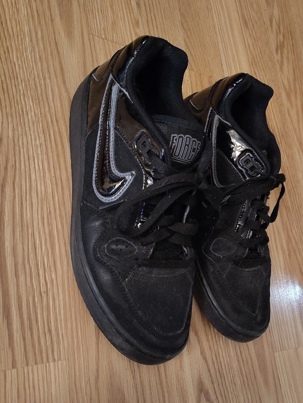 Nike Black Men's Low-Top Sneakers with Patent Swoosh